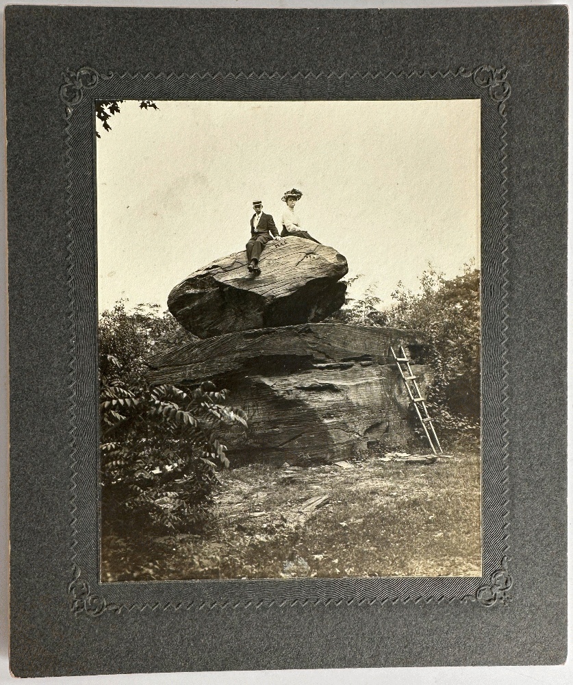 19th Century Photograph of a Man and a Woman Sitting on a Rock, Balanced on Another Rock
